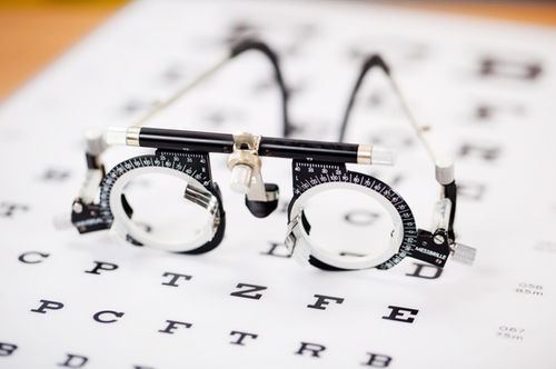 Trial frame on an eye chart